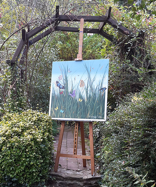 Bild mit Schmetterlingen in einer Wiese